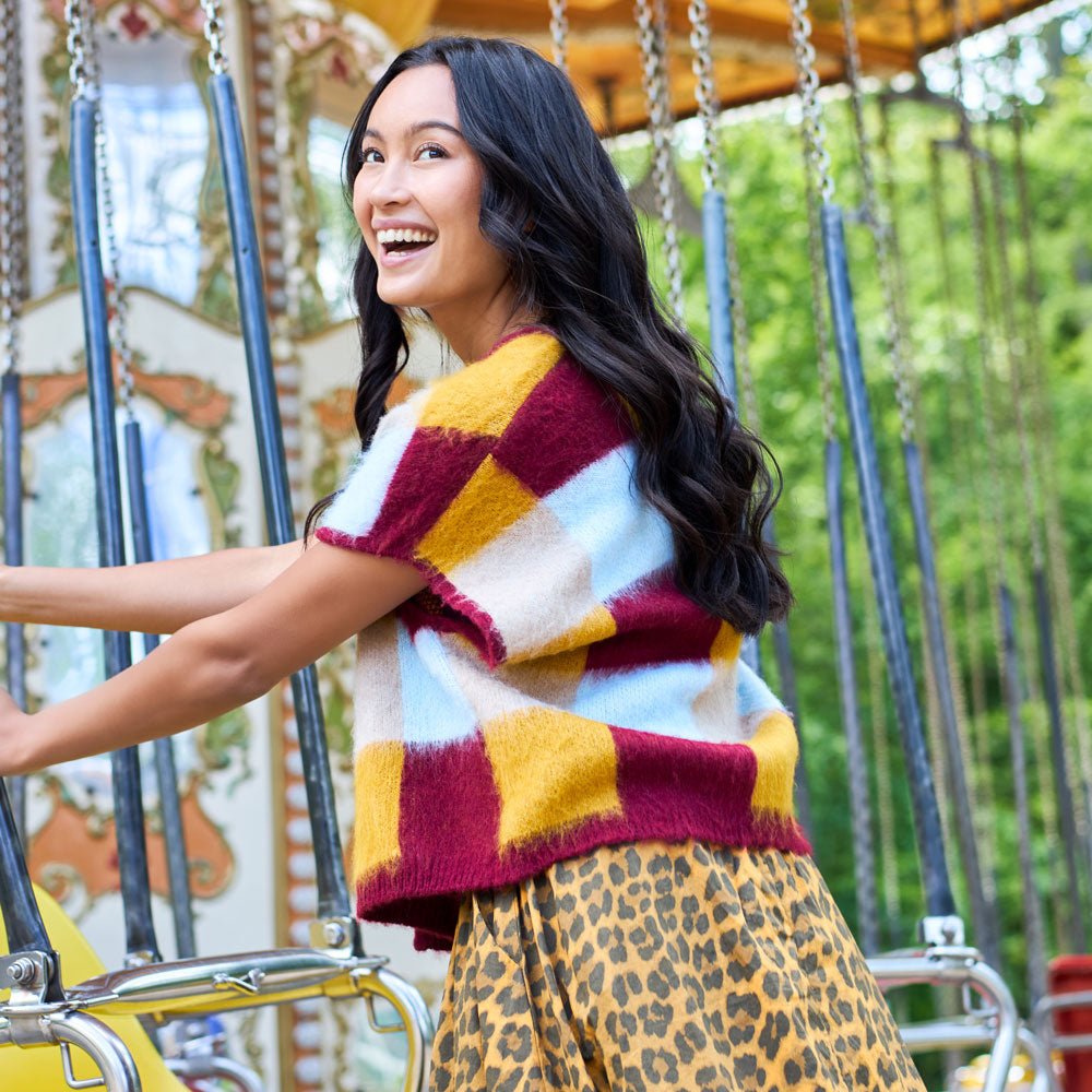 Sådan styler du striktrøjer i efteråret 2025